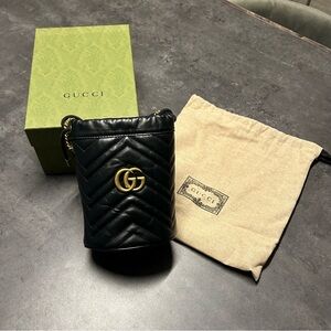 Gucci Black Quilted Cylinder Bag with Gold Logo